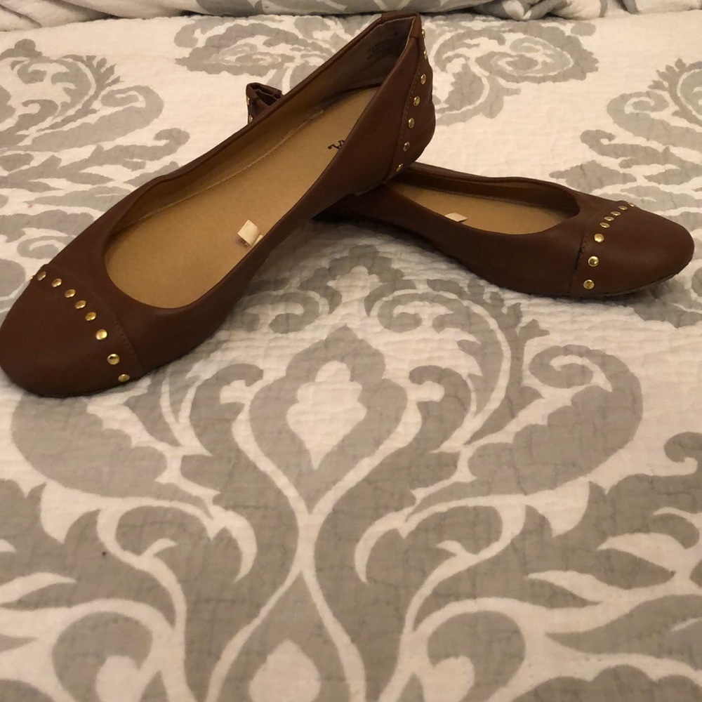 Brown flats with gold studs